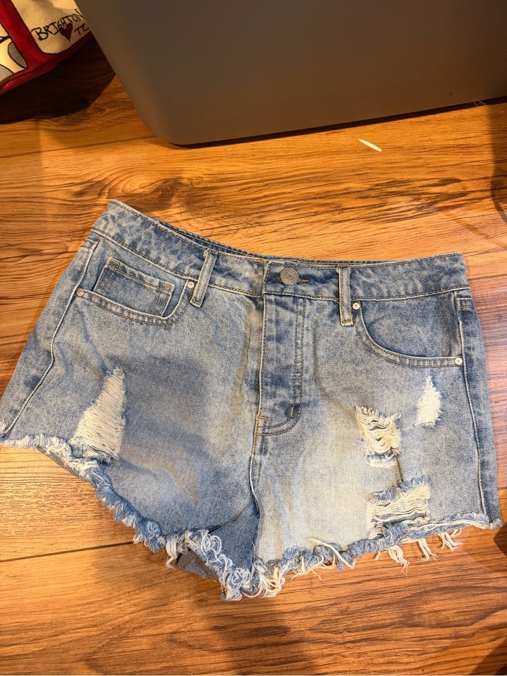 High-Rise Distressed Denim Shorts - Light Blue